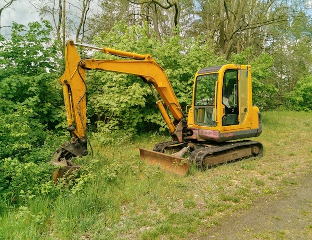 A mini excavator in forests