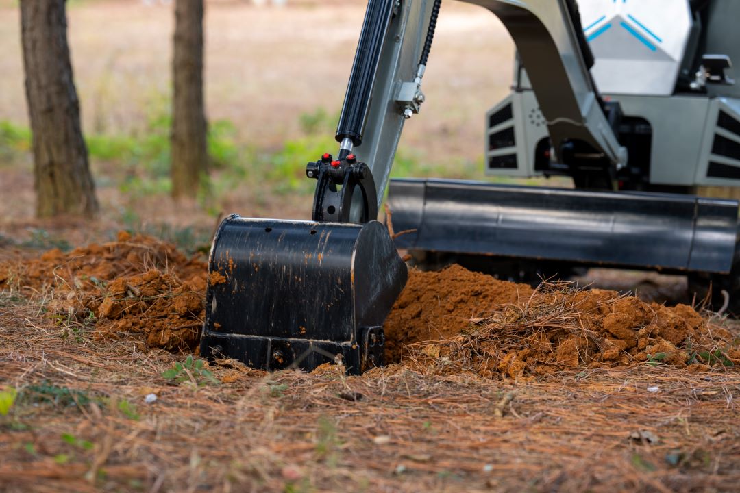 Mini excavator bucket attachment